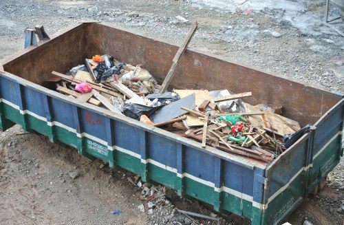 Commercial waste collection team assessing a probate property