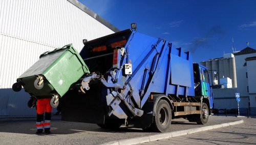 Team conducting rubbish clearance in a house