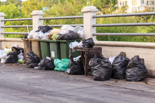 Council rubbish collection van removing household waste