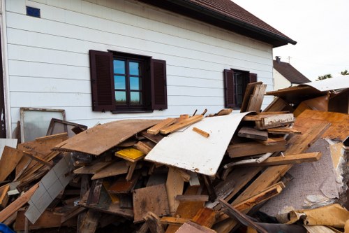 Family members working together during house clearance in Bexleyheath